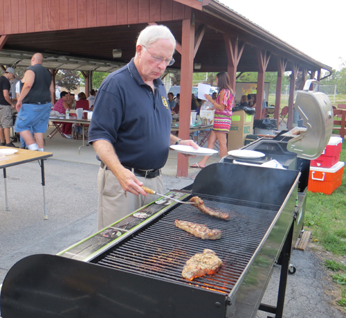 Members of local civic groups grilled the steaks at the Wheatfield Lions Club's annual steak roast.