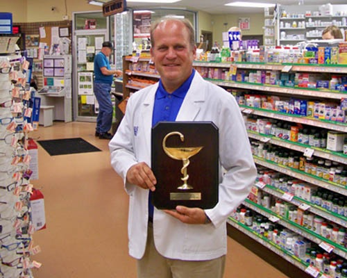 Pharmacist Stephen Giroux of the Summit Park Pharmacy.